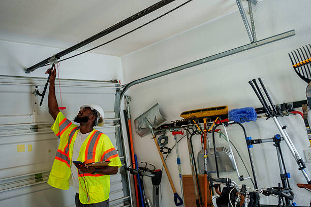 Professional Garage Door Maintenance technician working in Madera, CA
